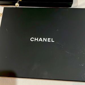 Authentic Chanel Classic long Necklace.  Silver and pearl.